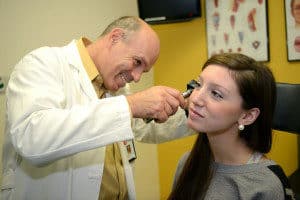 Pediatric ENT specialist assessing a young patient for hearing loss in Birmingham, AL