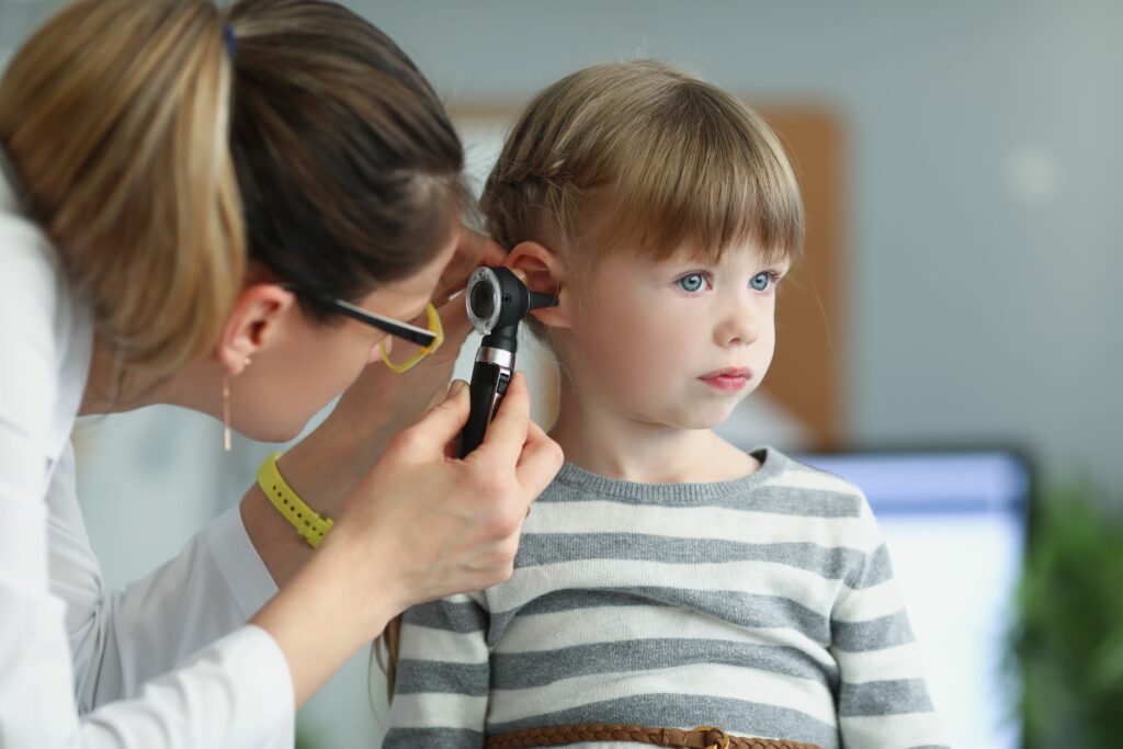 pediatric ent associates specialist examining child's ear birmingham al